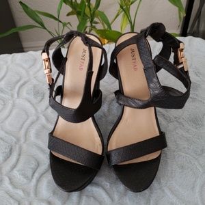 6 inch black thick heel sandal.